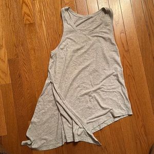 Lululemon tank with side slit. Size 2. Barely worn.
